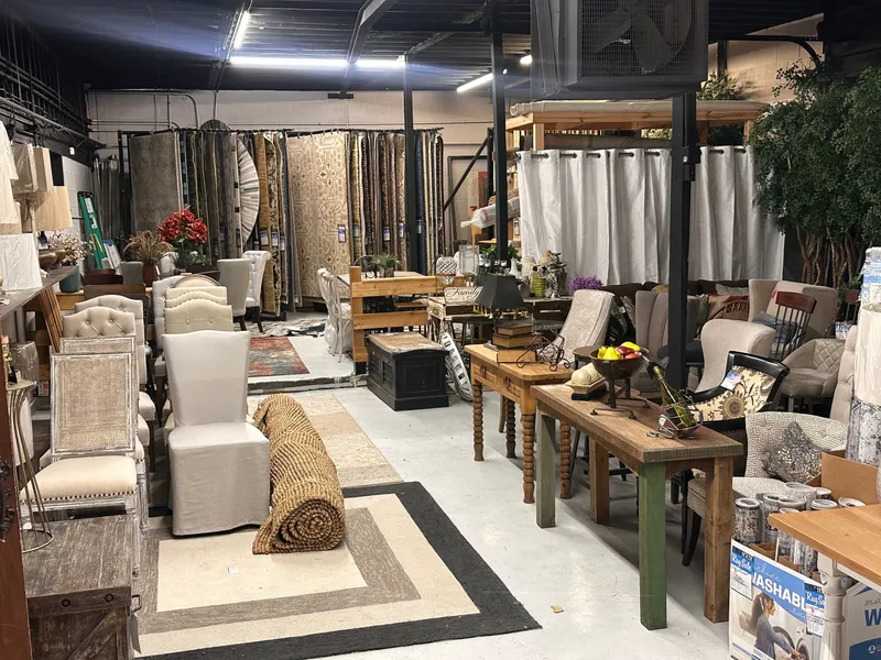 Layered furniture, rug, and accessory display